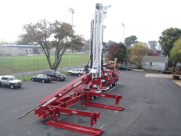 Schramm TXD LoadSafe compact trailer mounted automated pipe system and drill rig outside of Schramm's US shop location.