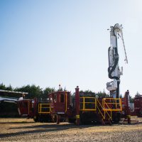Two Exploration Drill Masters 45K-D high capacity Top Drive Diamond Drill Rigs side by side.