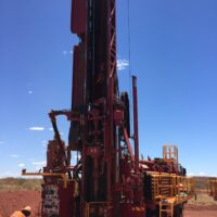Schramm T685 drill rig in the field on a clear day.