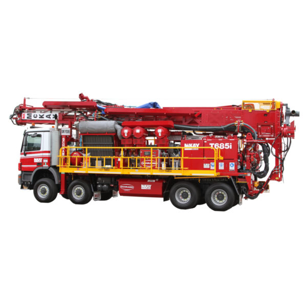 Schramm T685i drill rig on truck with a solid white background.